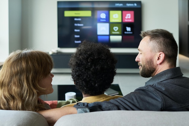 family watching television together living room 274679 55280